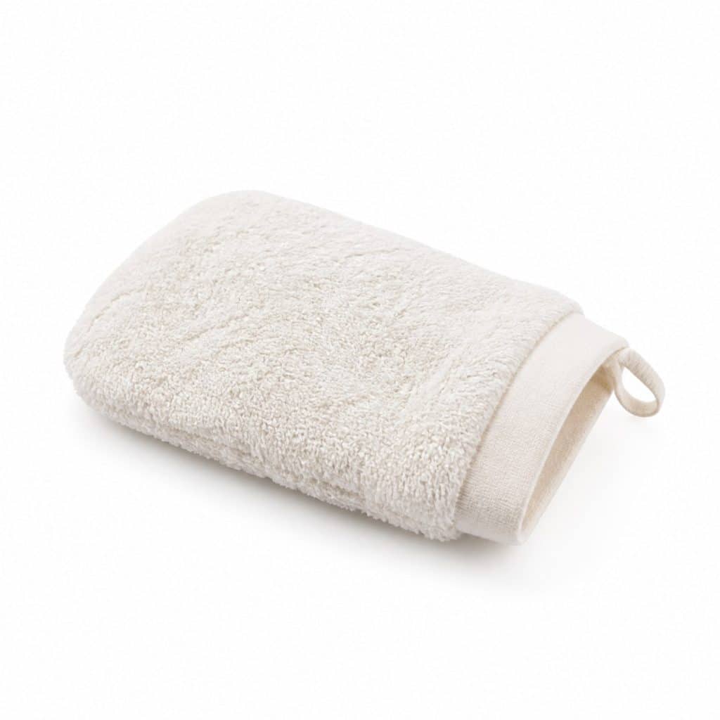 Gant de toilette éponge pour nouveau-né présenté seul